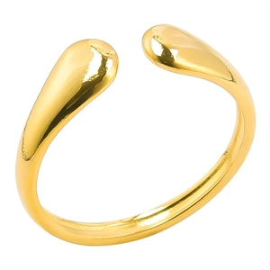 Detailed view of polished golden open ring featuring a unique double teardrop design