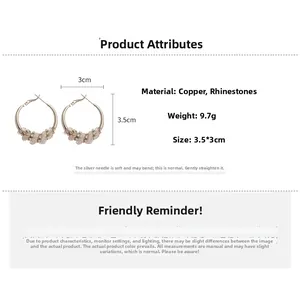 Detail view of rhinestone pavé hoop earrings showing 3.5cm x 3cm size and 9.7g weight