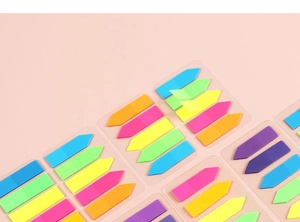 Arrow-shaped PET index stickers in assorted neon colors on clear backing sheets
