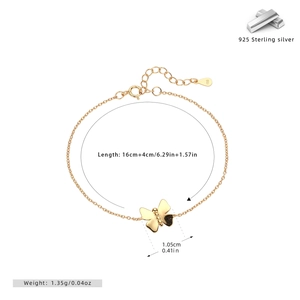 Macro shot of gold S925 sterling silver butterfly bracelet with detailed size measurements