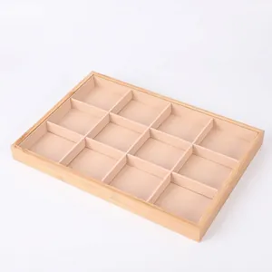 12-grid bamboo jewelry display tray with beige velvet lining for rings and earrings
