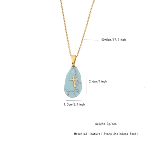 Detailed size specifications for gold cross necklace with teardrop turquoise stone