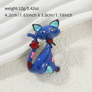 Detailed view of cat brooch with colorful flower patterns and dimensions 4.2cm x 3.0cm