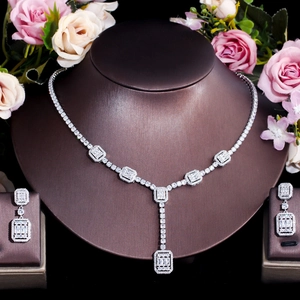 Sparkling silver bridal jewelry set with rectangular zircon necklace and drop earrings