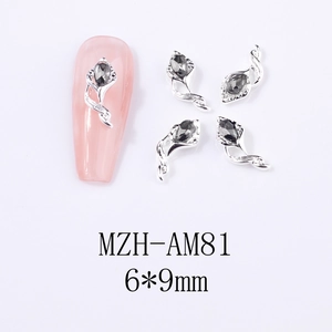 Detail of 6x9mm silver alloy nail charms with grey teardrop rhinestones on pink nails