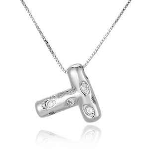 Detail of silver letter T pendant necklace with cubic zirconia pavé on a box chain