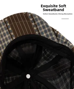 Detail view of cotton sweatband and breathable mesh lining inside a patchwork flat cap