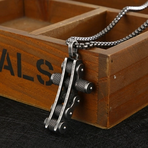 Retro hip-hop bicycle chain cross pendant on a dark box chain necklace for men