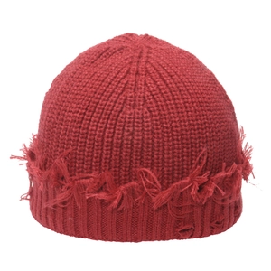 Deep red distressed knit beanie with ribbed texture and vintage ripped edge design