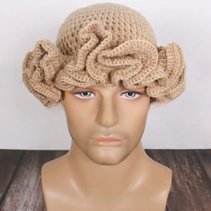 Macro detail of khaki crochet knit hat showing ruffled wavy brim and vintage handmade texture