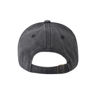 Detail view of the washed cotton baseball cap with adjustable bronze metal buckle strap