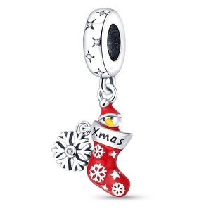 Detail showing red Christmas stocking and silver snowflake pendants with Xmas engraving