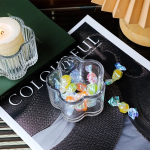 Nordic plum blossom crystal glass candle holder used as a colorful candy storage dish