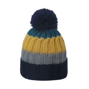 Close-up of multicolor striped knit beanie with navy pom-pom and thick ribbed texture