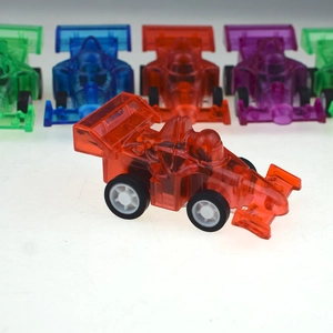 Close-up of colorful transparent F1 pullback toy cars for children in various vibrant colors
