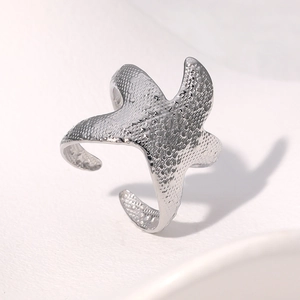 Minimalist silver starfish open ring in stainless steel with textured finish detail