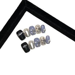 Handmade press-on nails set with chrome silver, black, and purple heart cross designs