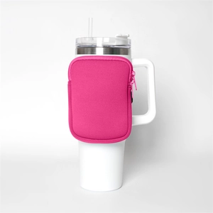 Pink neoprene zipper pouch accessory attached to a 40OZ stainless steel tumbler cup