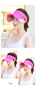 Detail view of pink sun visor with retractable side brim and sport logo for sun protection