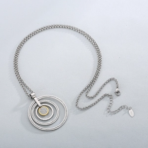 Two-tone concentric ring pendant necklace with crystals on double strands chain