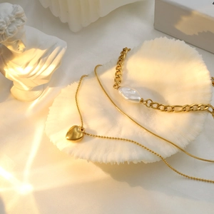 18k gold plated stainless steel layered heart pendant necklace with baroque pearl detail