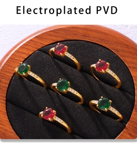 Detailed view of rose red and green zircon rings with premium electroplated PVD gold finish