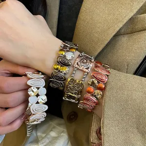 Vintage enamel square heart stretch bracelets set featuring hollow design and retro aesthetic