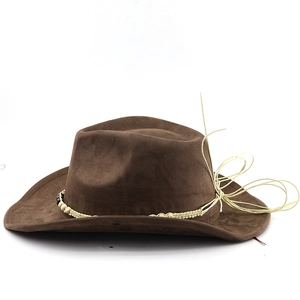 Detailed texture of dark brown suede cowboy hat with beaded woven band and curved brim