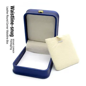 Boîte à bijoux élégante en cuir bleu foncé avec taille incurvée et intérieur crème