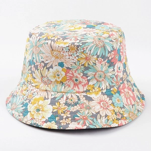 Detailed view of colorful floral pattern and cotton fabric texture on the bucket hat
