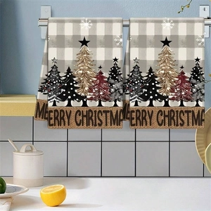 Hanging Christmas towels with plaid patterns and Merry Christmas text on a rack