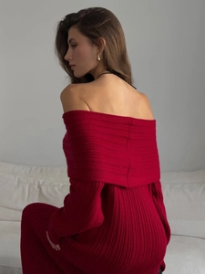 Close-up of the ribbed knit texture and off-shoulder back detail on dark red dress