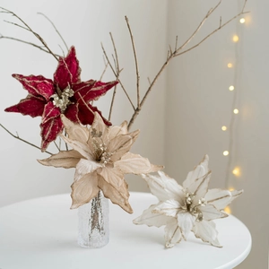 Velvet artificial Christmas flowers with glitter in burgundy champagne and white tones