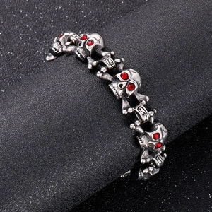 Hip hop men's stainless steel skull bracelet with red eyes in vintage silver finish