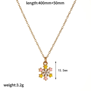 Gold snowflake pendant necklace with colorful enamel and diamond detail, 400mm+50mm length