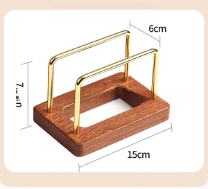 Detailed view of ebony wood base with golden metal rack showing precise dimensions