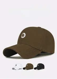 Detailed close-up of premium cotton baseball cap featuring high-quality letter embroidery