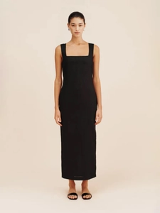 Front full-length view of a slim fit square neck black cotton linen maxi dress