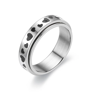 Spinner anxiety ring with black heart patterns in polished silver stainless steel finish