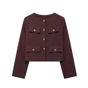 Close-up of wine red tweed jacket with gold metal buttons and four flap pockets