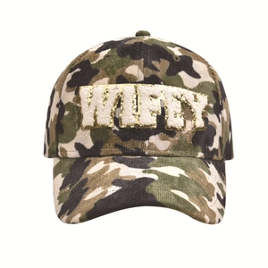 Detailed close-up of WIFEY patch embroidery on camo corduroy baseball cap texture