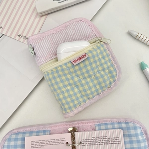 Quilted floral fabric small pouch for stationery and accessories with zipper closure