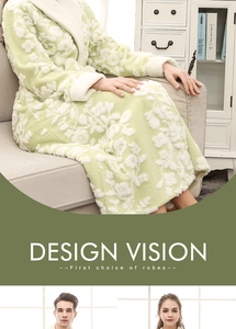 Detail of soft floral flannel bathrobe showing plush texture and white flower patterns