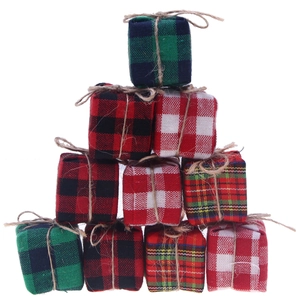 Set of plaid Christmas gift box ornaments with rustic twine, stacked on a white background
