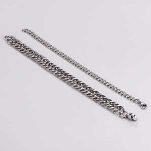 Polished silver stainless steel curb chain bracelet set in two widths for men