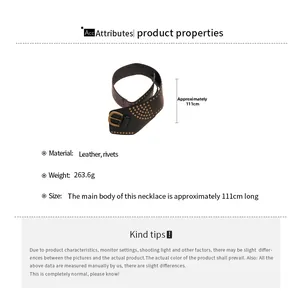 Detail view of vintage leather belt with golden rivets and bronze buckle, length 111cm