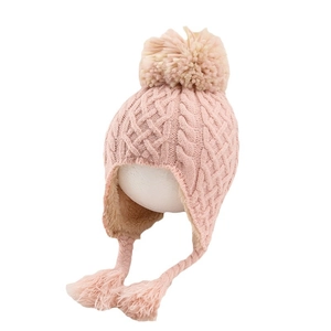Pink knit winter hat for girls with ear flaps, fleece lining and decorative pompoms