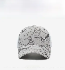Detail view of grey marble print baseball cap with white mesh back and sport embroidery