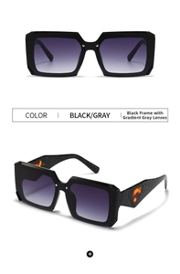 Detail of square sunglasses with black frames, gradient gray lenses and tortoise triangle trim