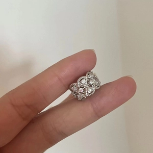 Silver openwork ring with sparkling cubic zirconia crystals in a retro design